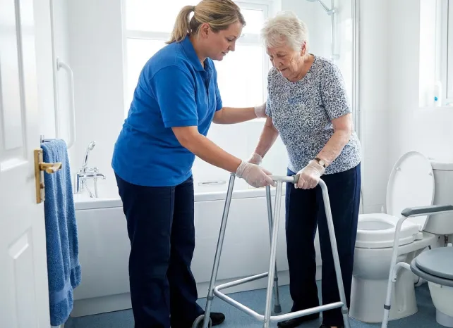 A carer assisting with daily care